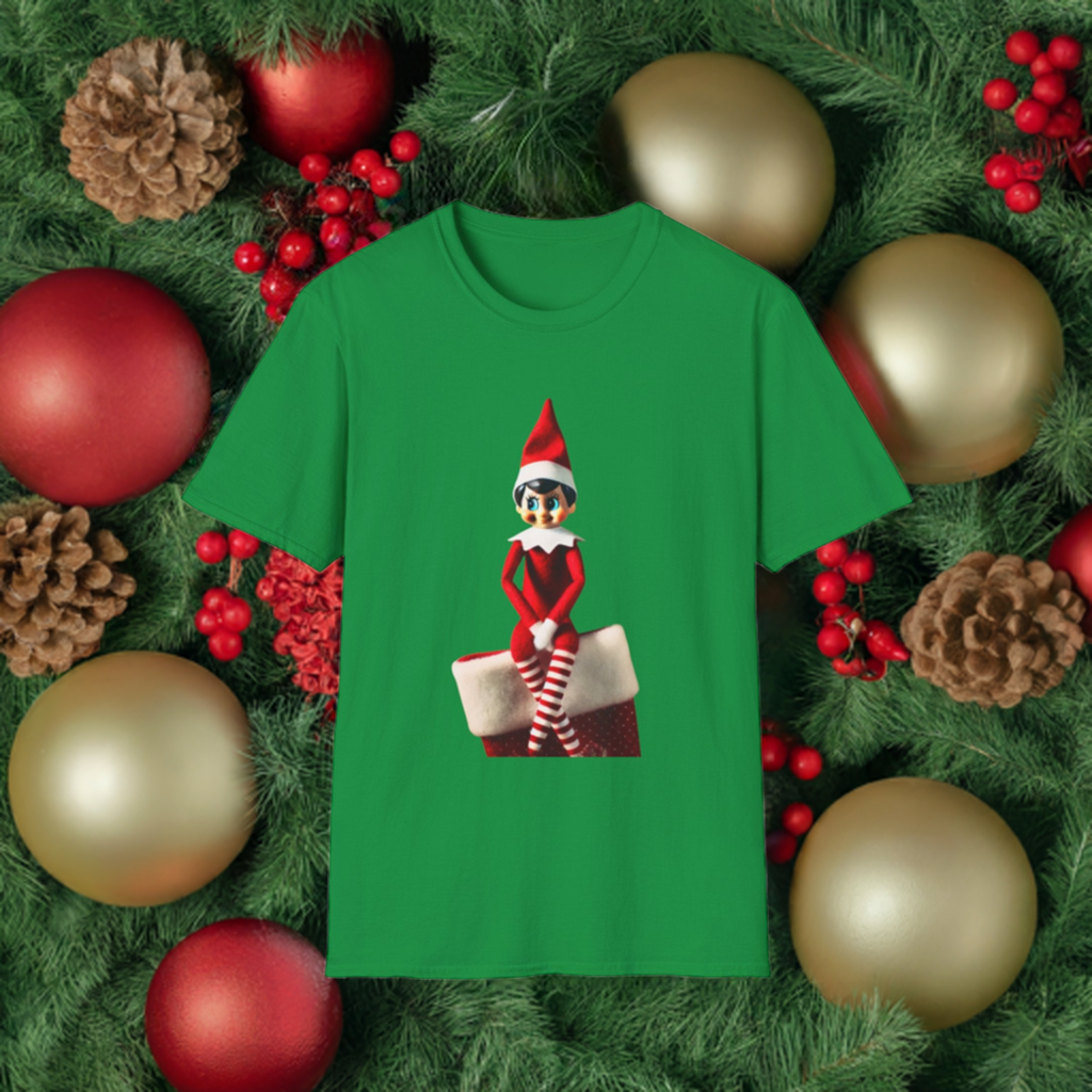 Elf on the Shelf green t-shirt placed around ornaments